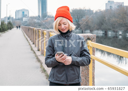 Outdoor Portrait of mature 40s fitness woman with 65931827