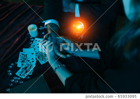 reading the lines hand in a business man's hands 65933095