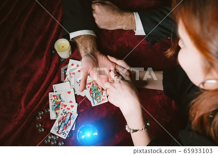 reading the lines hand in a man's hands 65933103