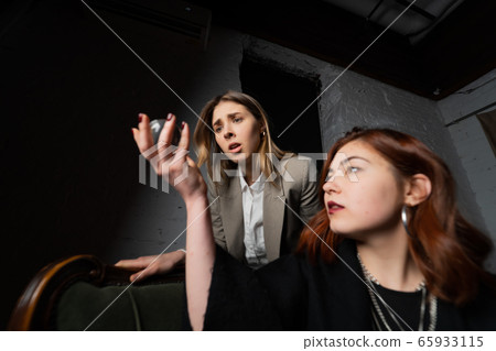 Woman and woman fortune teller with crystal ball Woman and woman fortune teller with crystal ball 65933115
