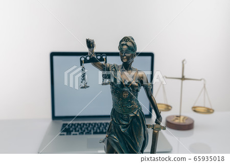 Judge gavel with Justice lawyers having team meeting at law firm background. Concepts of Law and Legal services 65935018