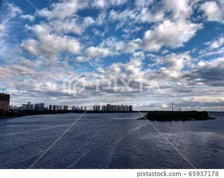 Landscape of the river with clouds from the bridge in the city of Kiev 65937178