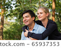 Romantic couple in love in the park 65937353