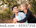 young romance couple relax in the park 65937358