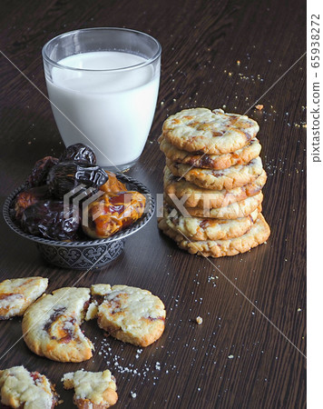 Fresh juicy date cookies with milk Fresh juicy date cookies with milk 65938272