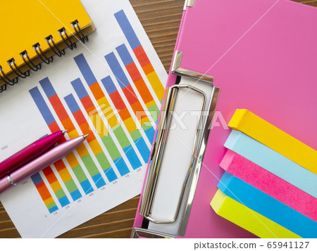 Business image, graph, binder, notebook, woman 65941127