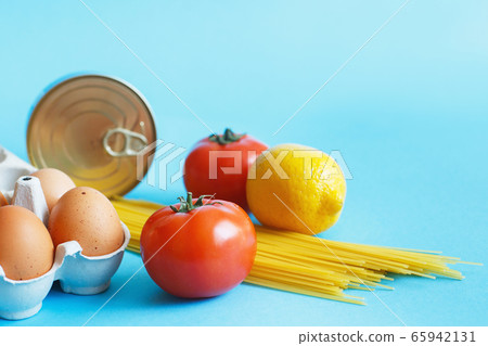 Different healthy food products on a blue background. Top view. Flat lay. Grocery online shop background 65942131