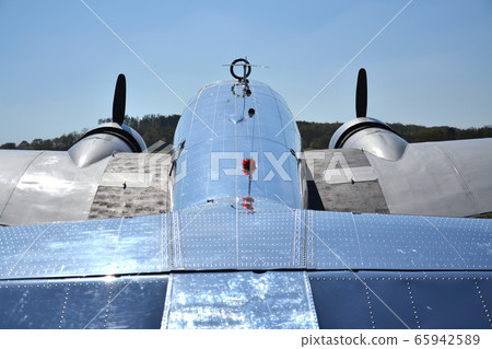 Lockheed Electra 10A vintage airplane preparing for flight on airport in Prague, Czech republic Lockheed Electra 10A vintage airplane preparing for flight on airport in Prague, Czech republic 65942589