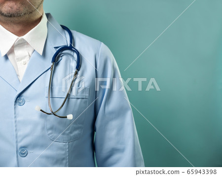 Man in protective suit and medical mask on blue 65943398
