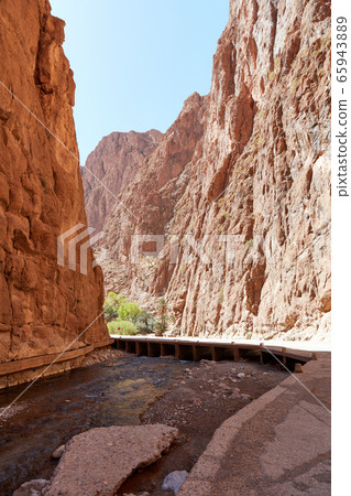 Todra Gorge, a canyon in the High Atlas Mountains in Morocco. Todra Gorge, a canyon in the High Atlas Mountains in Morocco. 65943889