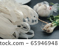 Noodles and garlic and coriander 65946948