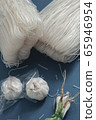 Noodles and garlic and coriander 65946954