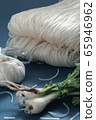 Noodles and garlic and coriander 65946962