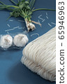 Noodles and garlic and coriander 65946963