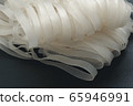 Preserve noodles on a black background. 65946991