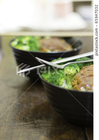 Pork burger rice with homemade broccoli for lunch 65947032