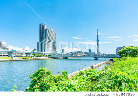 Tokyo Summer Illuminated Clouds and Sky Tree Urban Landscape 65947050