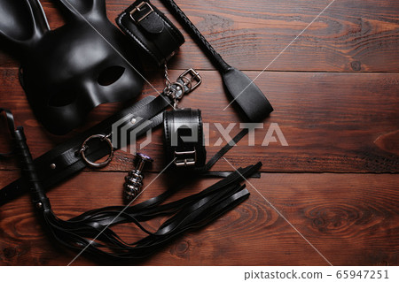 domination sex toys BDSM sex toys for domination and submission. Whip with handcuffs Stock  Photo main image 0
