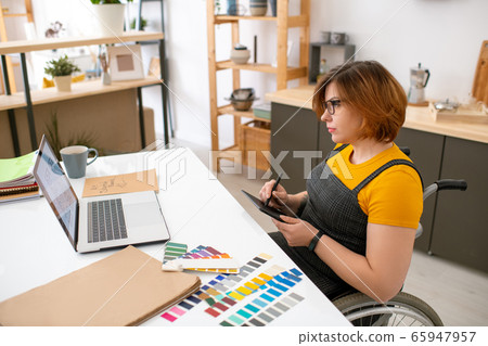 Working on design project at home Working on design project at home 65947957