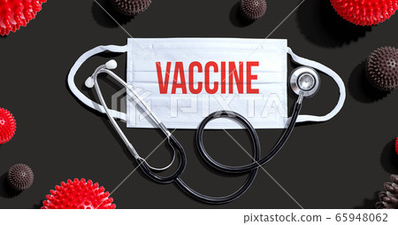 Vaccine theme with mask and stethoscope 65948062