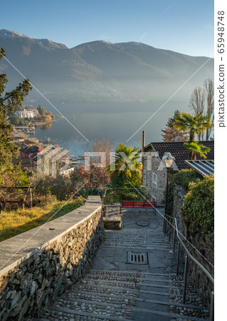 View of lake maggiore and swiss alps View of lake maggiore and swiss alps 65948748