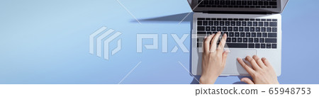 Person using laptop 65948753
