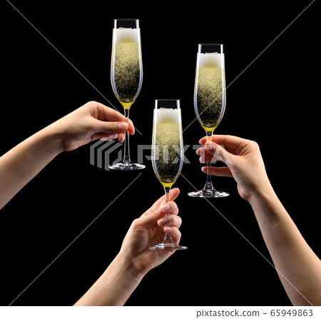 Set of hands holding glass of sparkling champagne 65949863