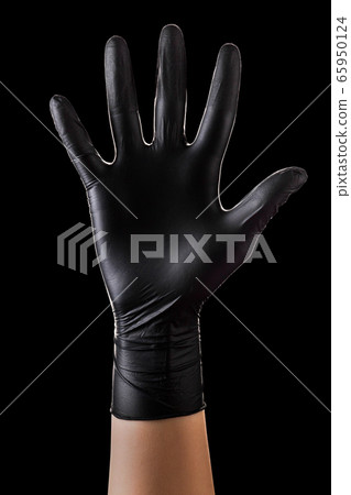 Hand in black gloves showing five fingers and palm 65950124