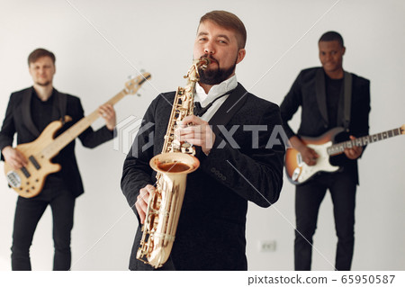 Music band in the studio with many instruments Music band in the studio with many instruments 65950587