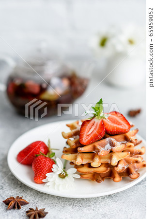 Delicious fresh baked belgian waffles with berries 65959052