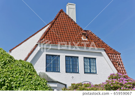 Traditional wooden houses in Gamle, which is a historic area of the city of Stavanger in Rogaland, Norway. 65959067