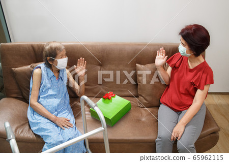 Keeping a safety distance in mother day , adult 65962115