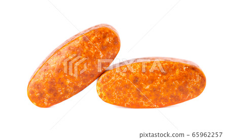 Two pills isolated on white background. Dietary 65962257