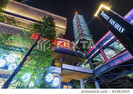 night view of the Xinyi District and Taipei 101 skyscraper in Taipei, Taiwan. The district is a prime shopping area in Taipei, anchored by a number of department stores and malls. 65962685