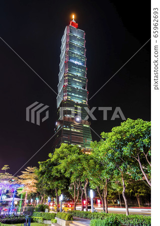 night view of the Xinyi District and Taipei 101 skyscraper in Taipei, Taiwan. The district is a prime shopping area in Taipei, anchored by a number of department stores and malls. night view of the Xinyi District and Taipei 101 skyscraper in Taipei, Taiwan. The district is a prime shopping area in Taipei, anchored by a number of department stores and malls. 65962693