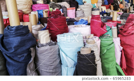Fabric in roll background Fabric in roll background 65965283