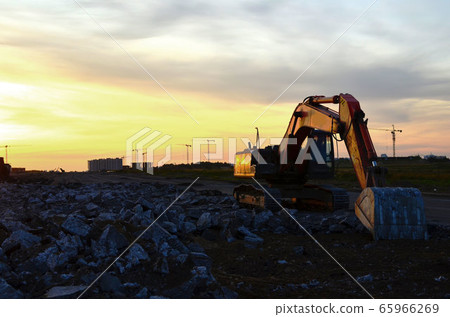 Excavator with bucket at construction site  65966269