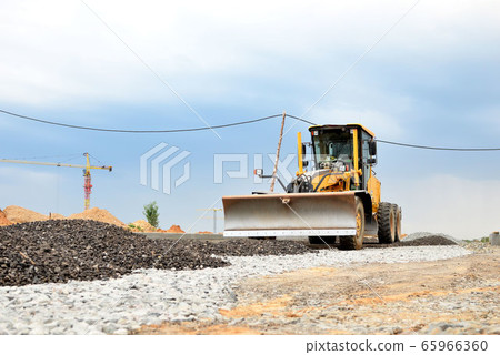 Grader machine at construction site Grader machine at construction site 65966360