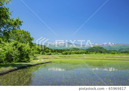 Kamafusa dam Zao mountain range rural landscape 65969817