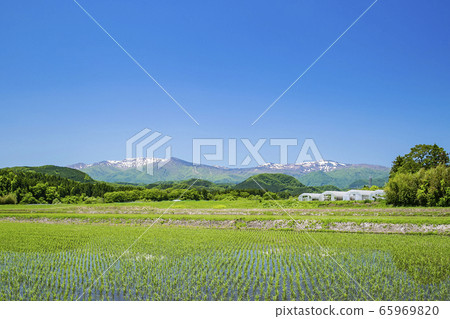 Kamafusa dam Zao mountain range rural landscape 65969820