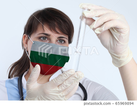 Scientist woman and mask with Bulgaria flag. 65969894