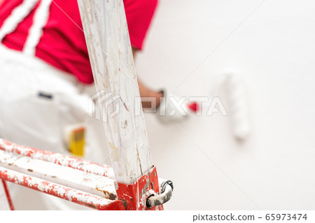 House painter worker at work in the construction 65973474