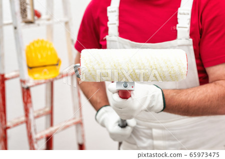 House painter worker with work tools. Construction 65973475