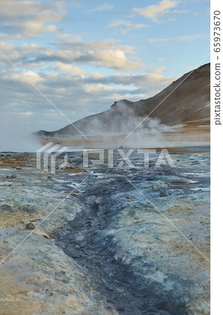 Geothermal area. Dramatic photo of soaring geysers in famous valley located in Iceland. Hot springs. Exploring Iceland 65973670
