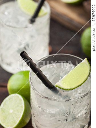 Gimlet Kamikaze cocktail in crystal glasses with Gimlet Kamikaze cocktail in crystal glasses with 65974022