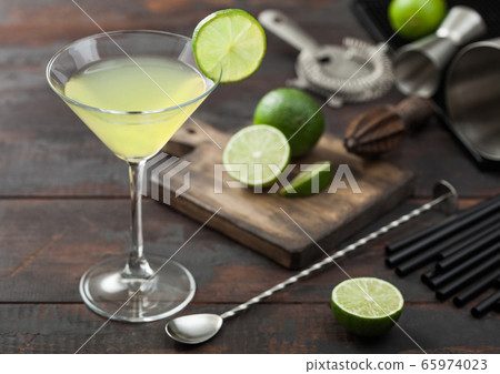 Gimlet Kamikaze cocktail in martini glass with Gimlet Kamikaze cocktail in martini glass with 65974023