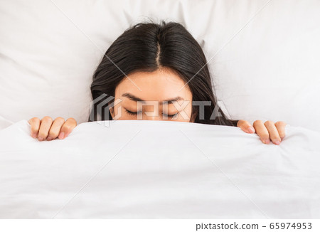 Korean Girl Sleeping Covered With Blanket In Bed Indoor, Top-View 65974953