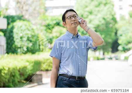 Male Middle Businessman Commuting Male Middle Businessman Commuting 65975184