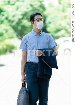 Male businessman summer commute Male businessman summer commute 65975222