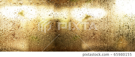 surface of wet gold metal with drop of water 65980155